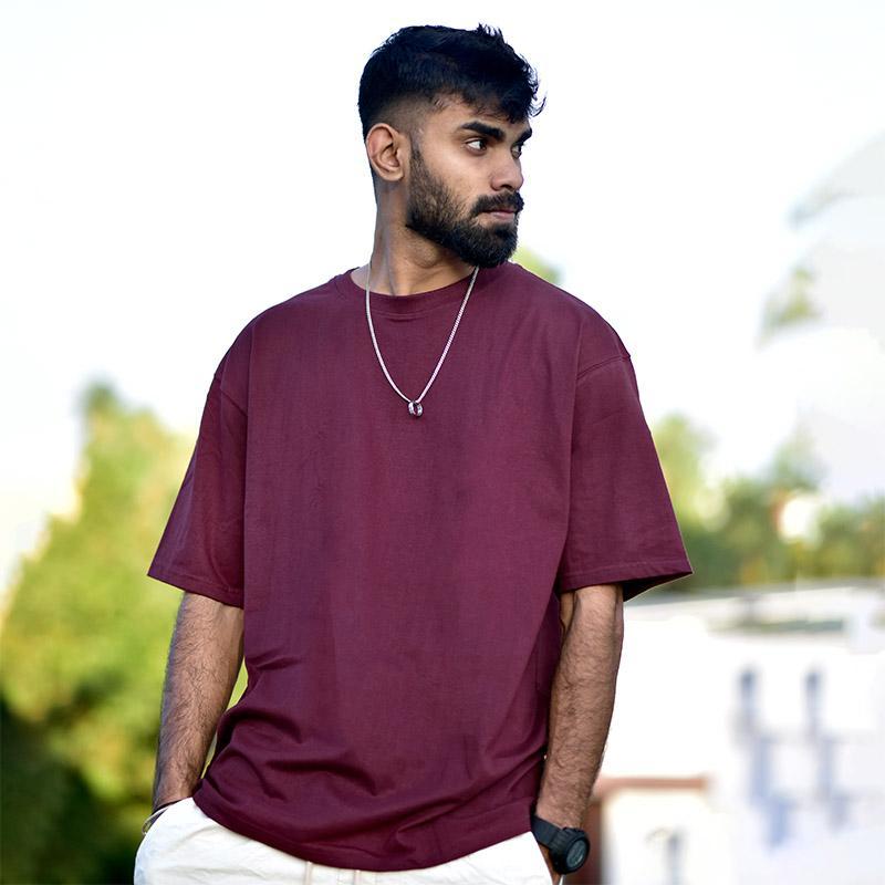 UK Rapper Arif Patel in Burgundy Oversized T-shirt